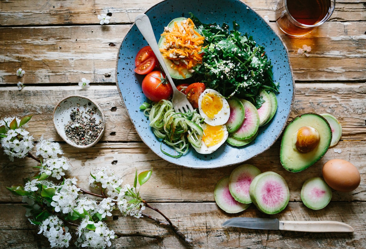 Whole grain bowl with legumes, seeds, and fresh herbs